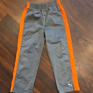 Puma 4t Gray Joggers with Vibrant Orange Stripes